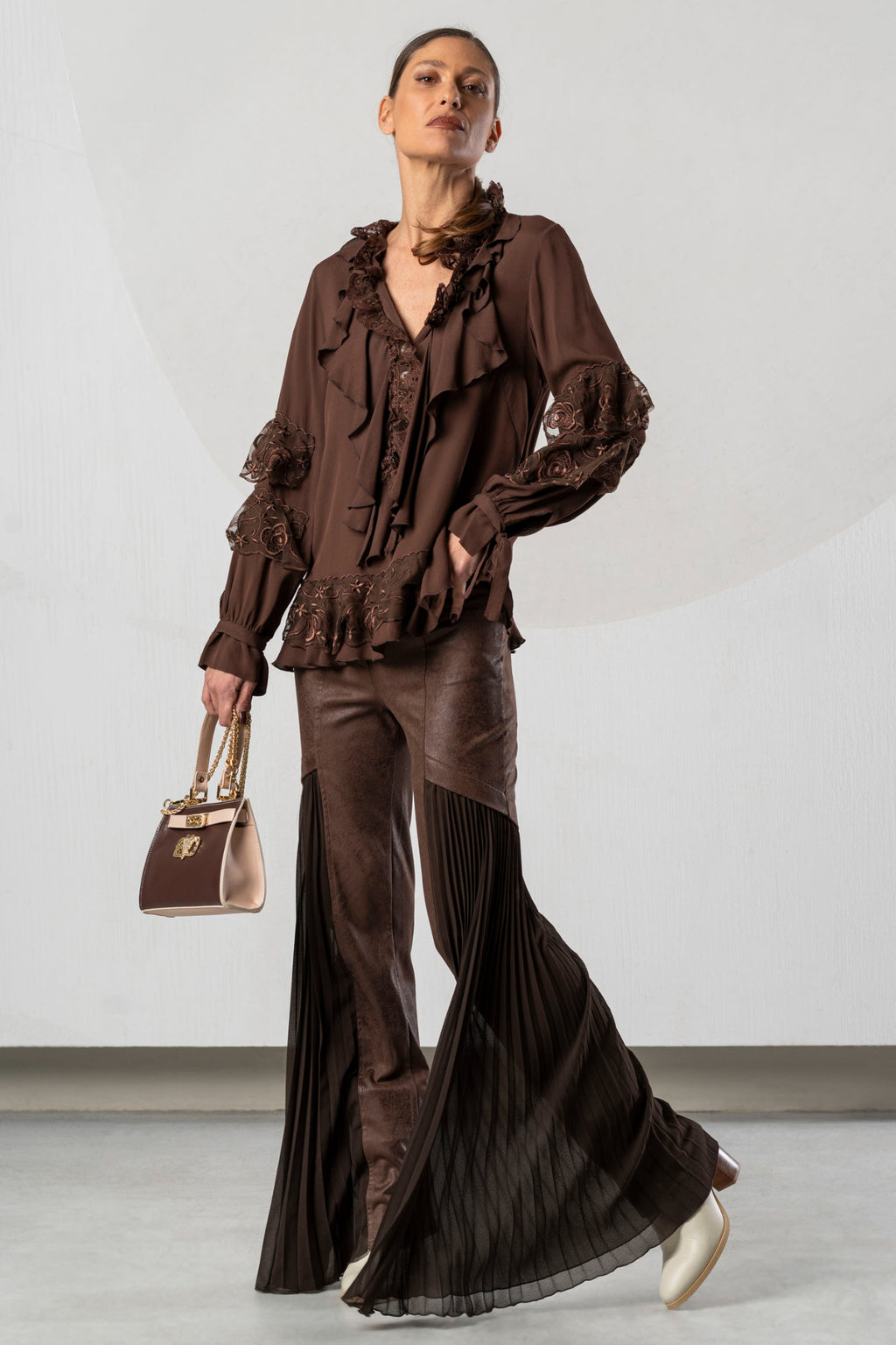 Shop the Elisa Cavaletti ELW265069101R Brown Blouse at Dotique. A luxurious 100% viscose designer blouse in rich chocolate brown for AW26.