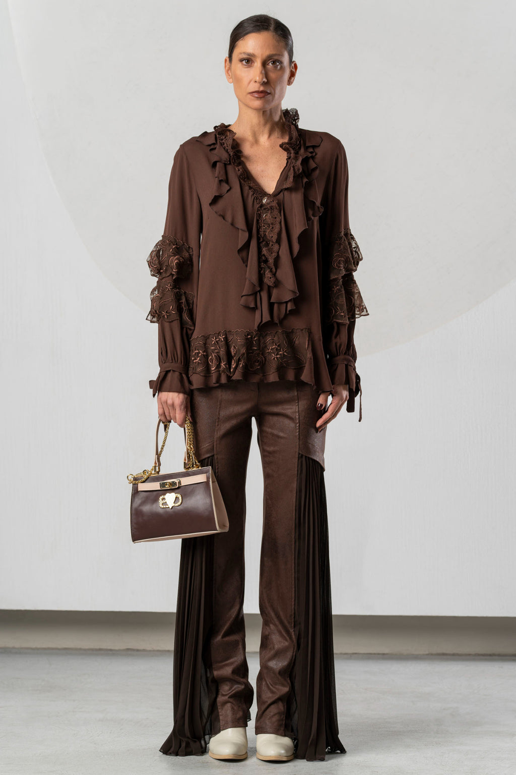 Shop the Elisa Cavaletti ELW265069101R Brown Blouse at Dotique. A luxurious 100% viscose designer blouse in rich chocolate brown for AW26.