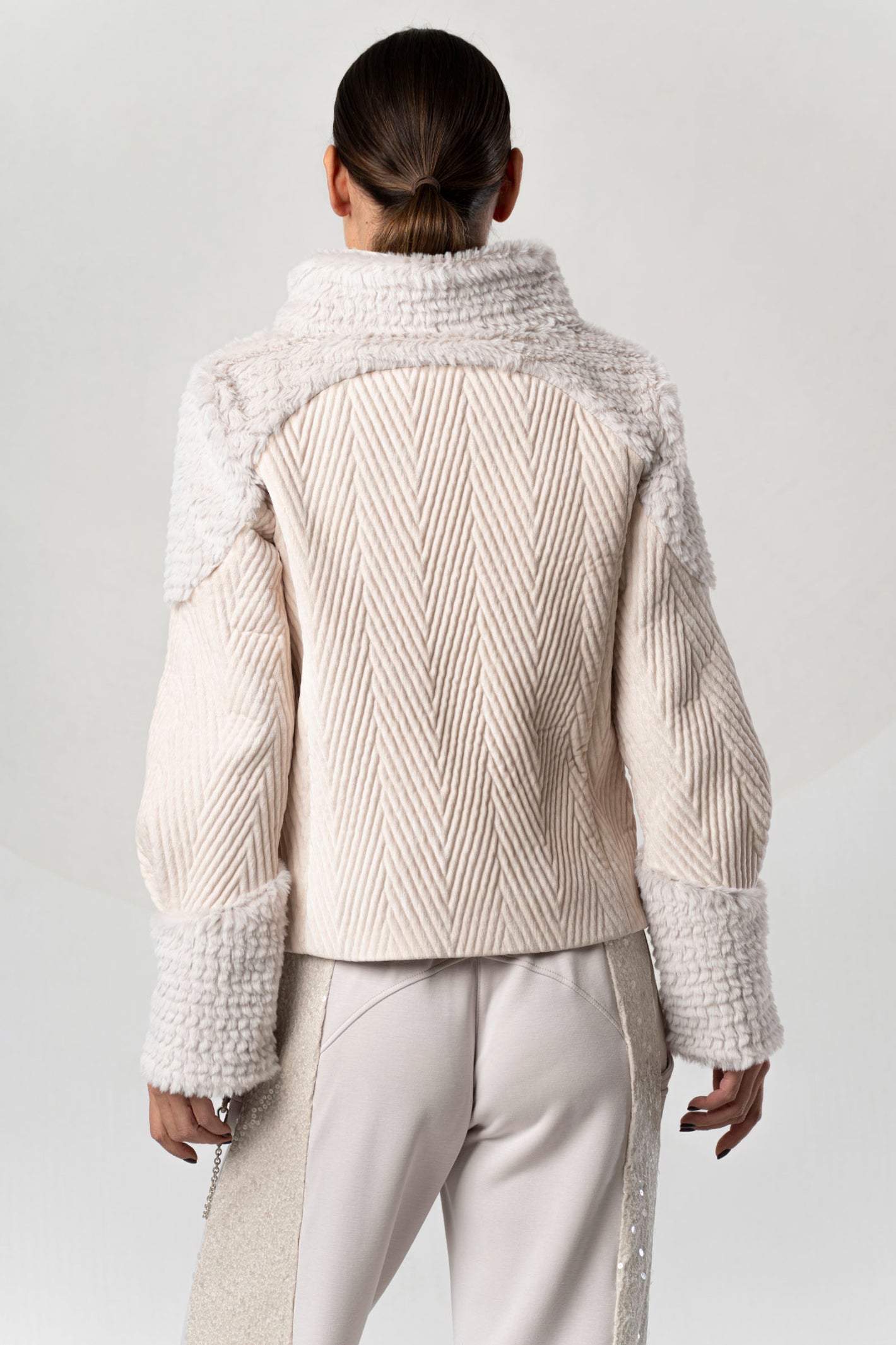 Discover the Elisa Cavaletti ELW267002800 Powder Pink Jacket at Dotique. A luxurious Italian designer jacket with beautiful texture and detailing.