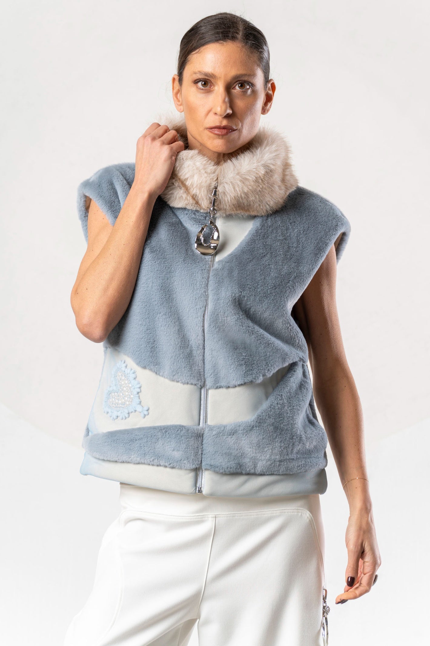 Discover the Elisa Cavaletti ELW267014504 Gilet at Dotique. A premium light blue and beige designer gilet with distinctive mixed-texture detailing.