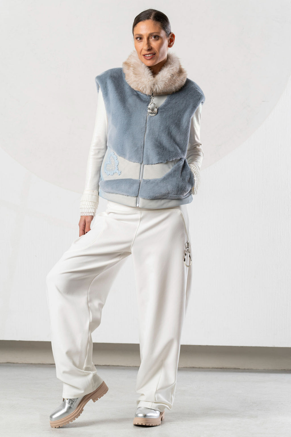 Discover the Elisa Cavaletti ELW267014504 Gilet at Dotique. A premium light blue and beige designer gilet with distinctive mixed-texture detailing.