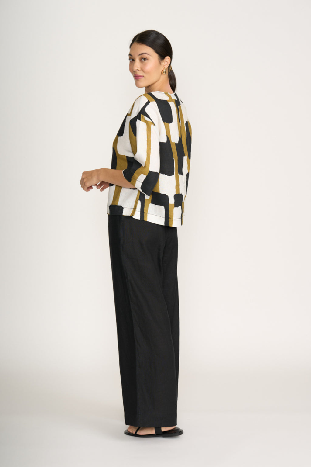Model wearing Foil Fo8232 Looking Sharp Top Art Box by Foil, shop Foil at Dotique for stylish relaxed fit tops.