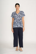 Model wearing Foil Fo8259 Broad Horizon Trousers Navy paired with patterned top, shop Foil at Dotique.