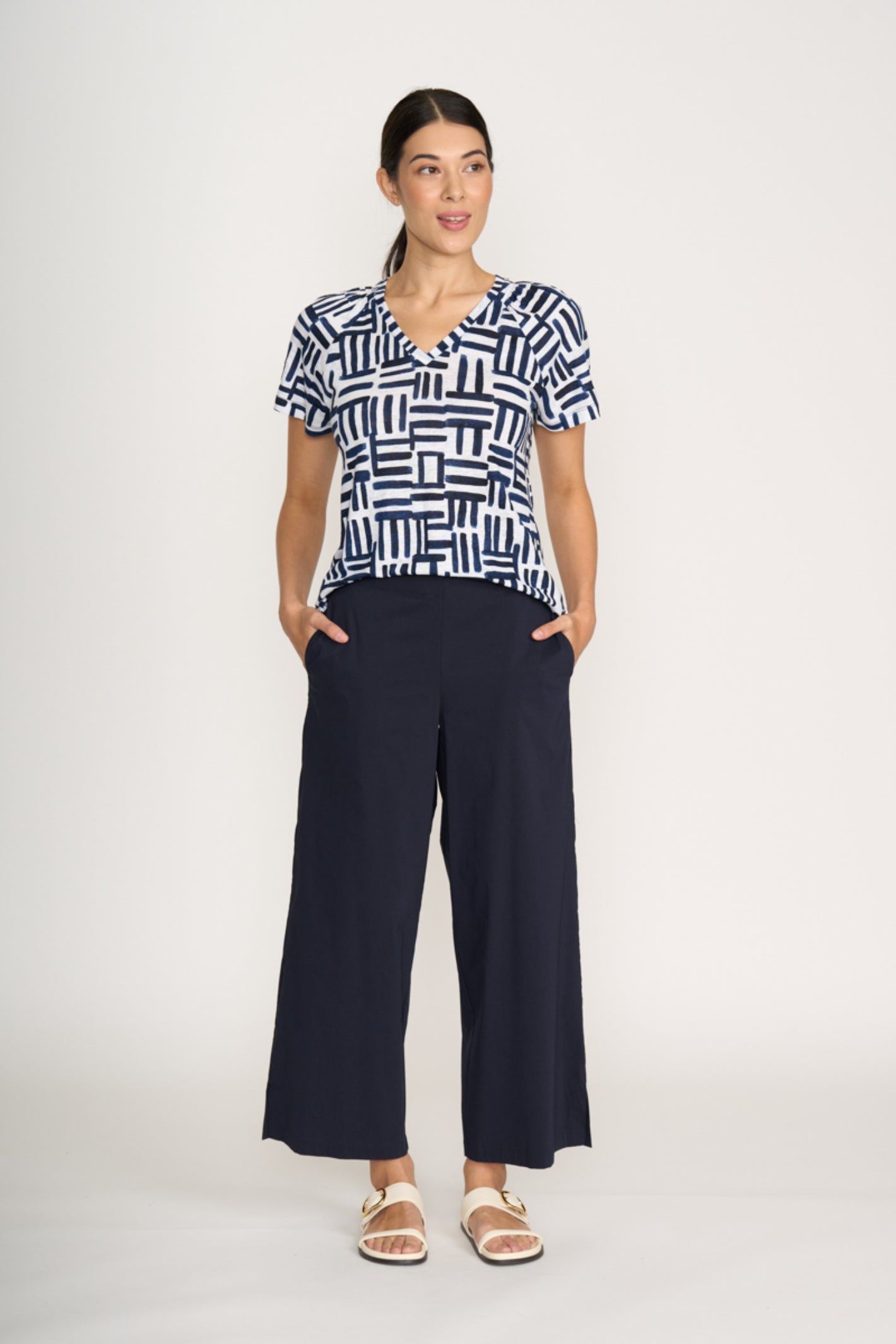 Woman wearing Foil Fo8259 Broad Horizon Trousers Navy by Foil, standing hands in pockets, shop Foil at Dotique.
