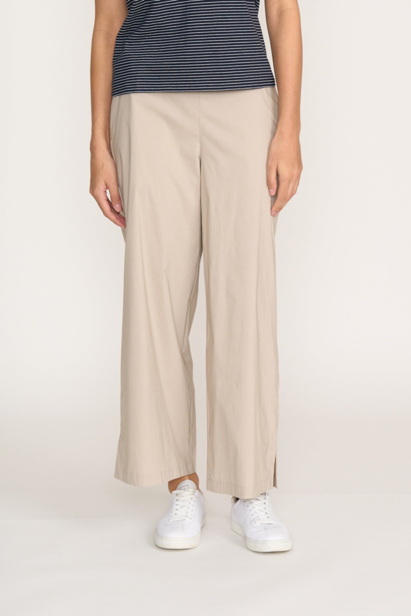 Front view of model wearing Foil Fo8259 Broad Horizon Trousers Sand styled with sneakers by Foil Shop at Dotique