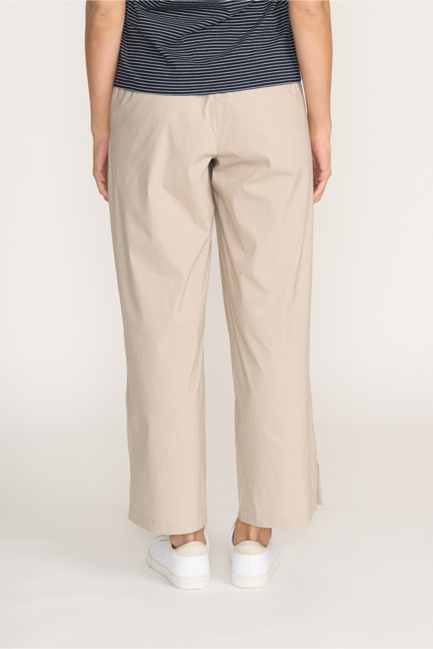 Rear view of model wearing Foil Fo8259 Broad Horizon Trousers Sand by Foil Shop at Dotique