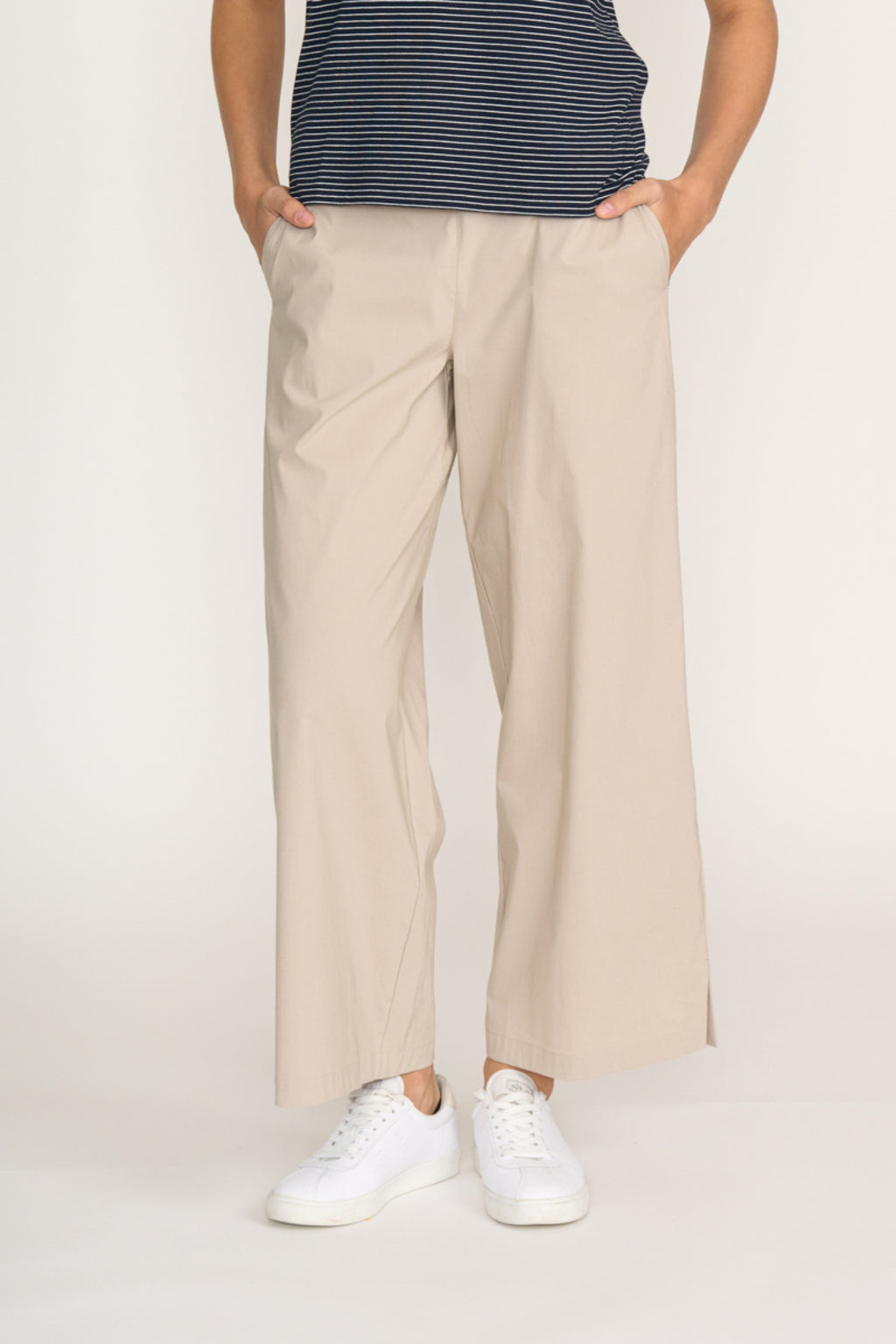 Front view of model wearing Foil Fo8259 Broad Horizon Trousers Sand paired with casual sneakers Shop Foil at Dotique