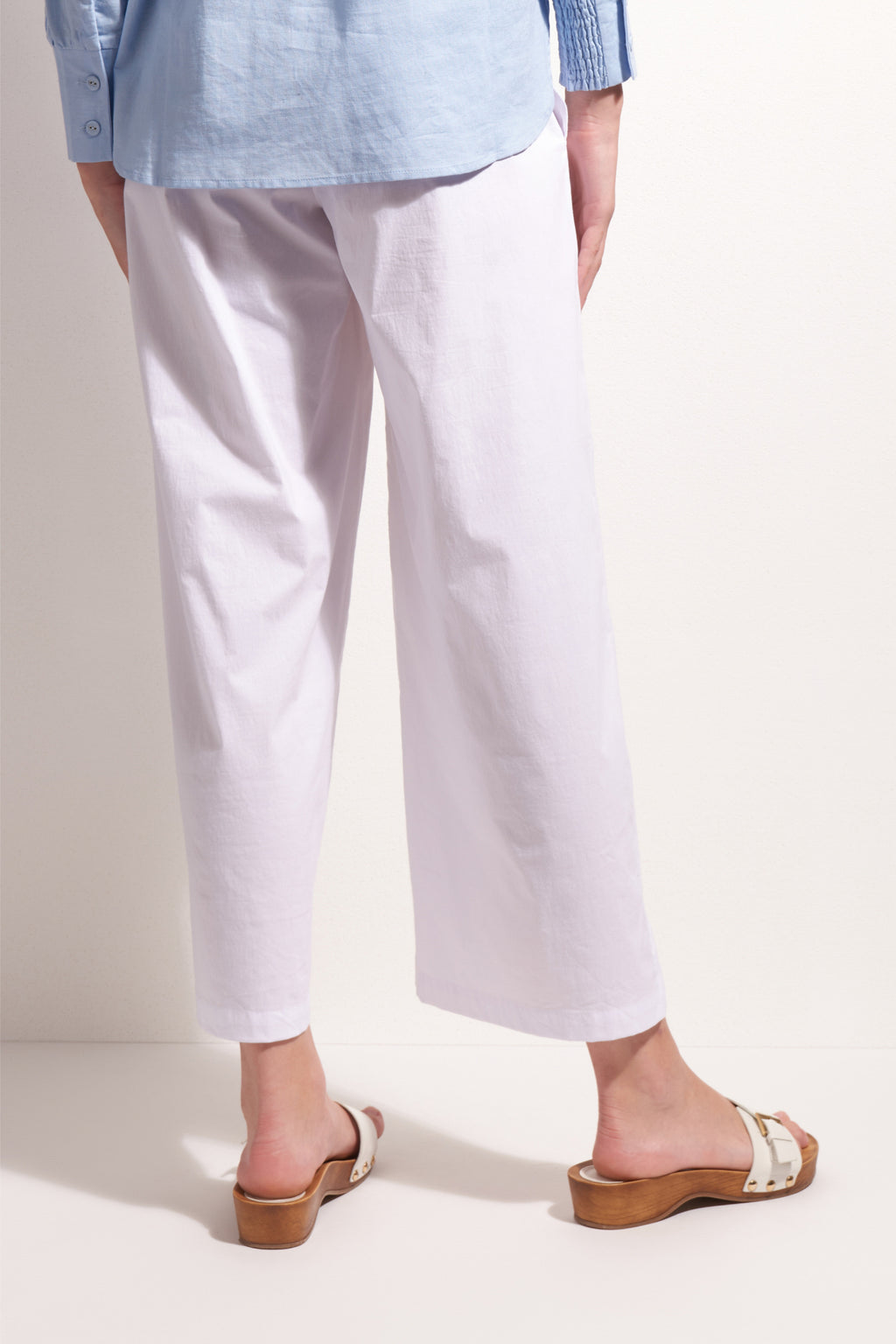 Foil Fo8259 Broad Horizon Trousers White shown from back with sandals Shop Foil at Dotique for summer style