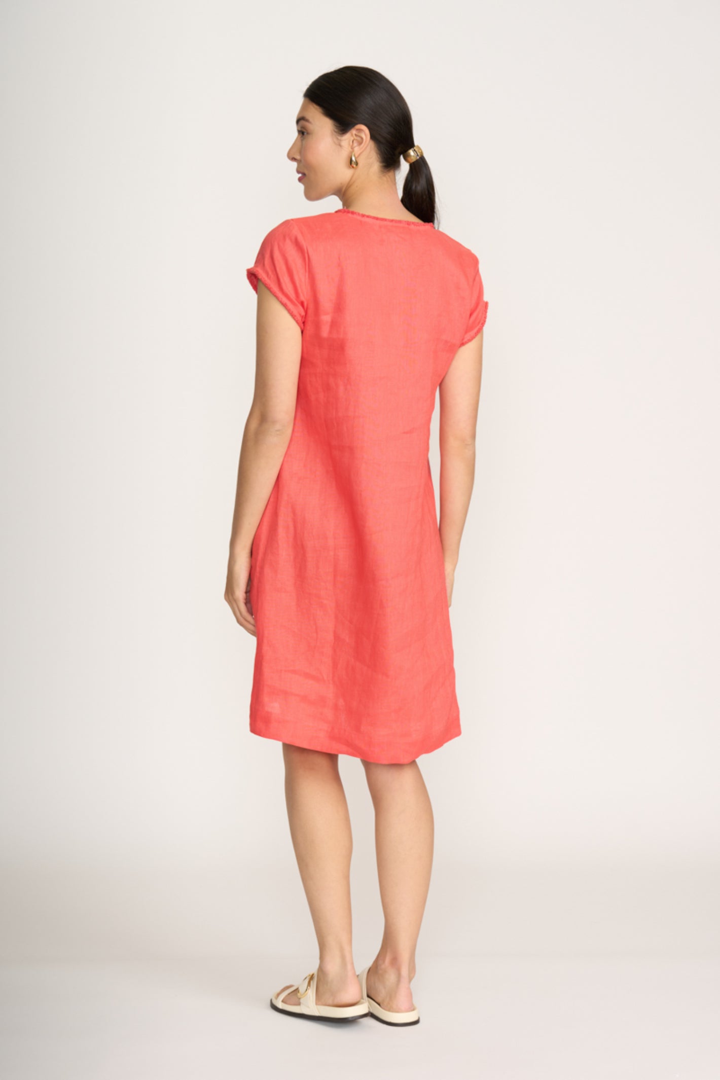 Woman wearing Foil Fo8314 Festival Dress Melon from Foil with short sleeves, shop Foil at Dotique for stylish summer dresses