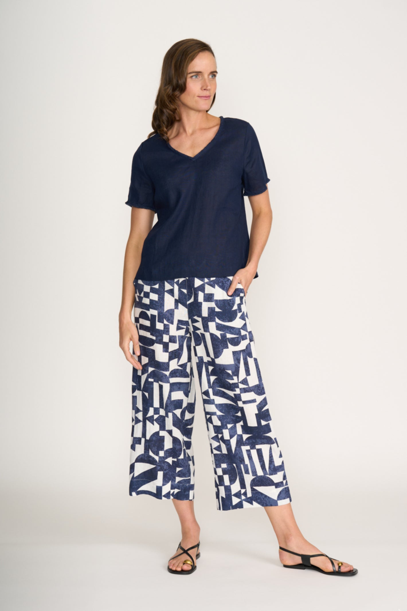 Model wearing Foil Fo8315 V Benefits Top Eclipse by Foil, shop the vendor at Dotique for relaxed stylish tops.