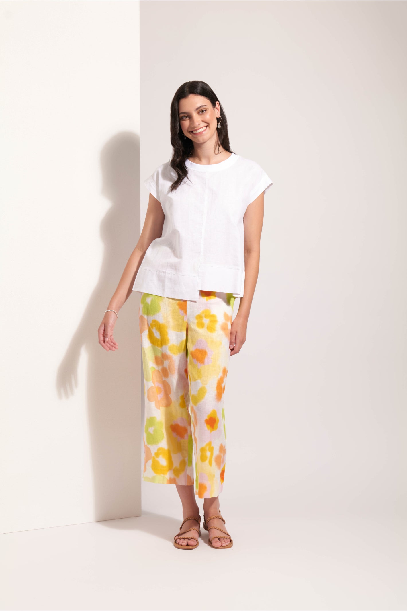Woman wearing Foil Fo8341 Cut Of Your Rib Top White by Foil, shop Foil at Dotique for stylish white tops.