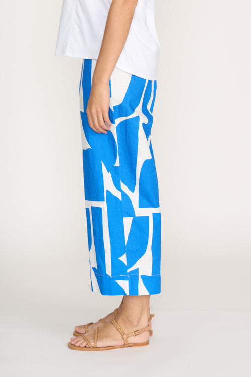 Side profile of model wearing Foil Fo8364 Natural Ability Trousers Reflection by Foil Shop the vendor at Dotique