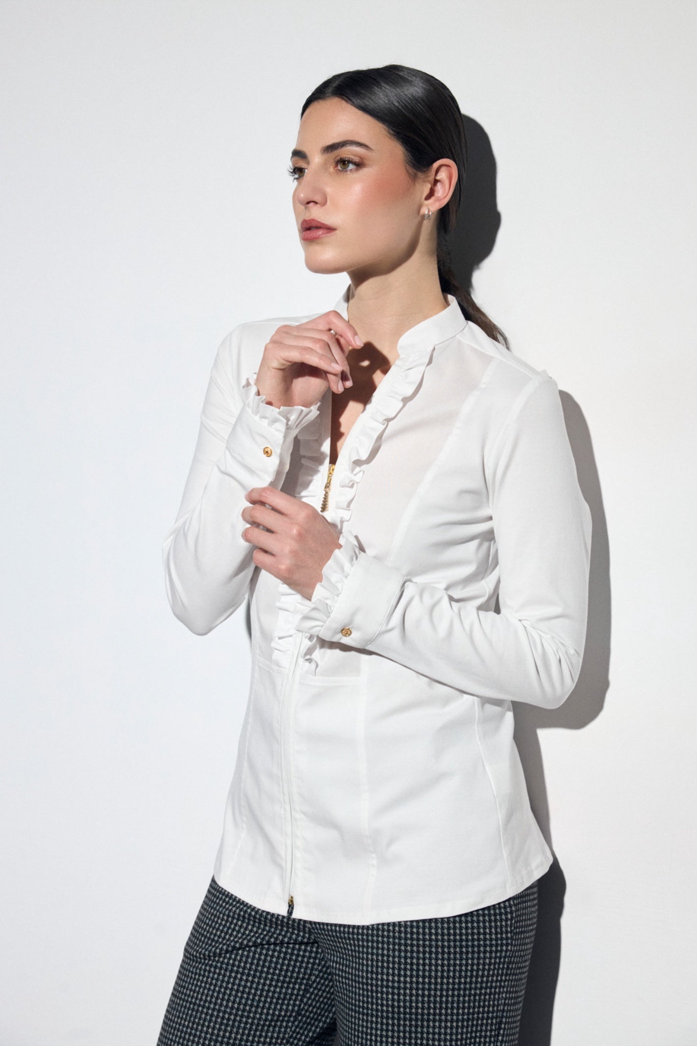 Shop the Tinta 4004201 Francisca Women's Shirt in White at Dotique. A beautifully tailored shirt with elegant ruffle detailing, a stand collar and concealed zip fastening for timeless styling.