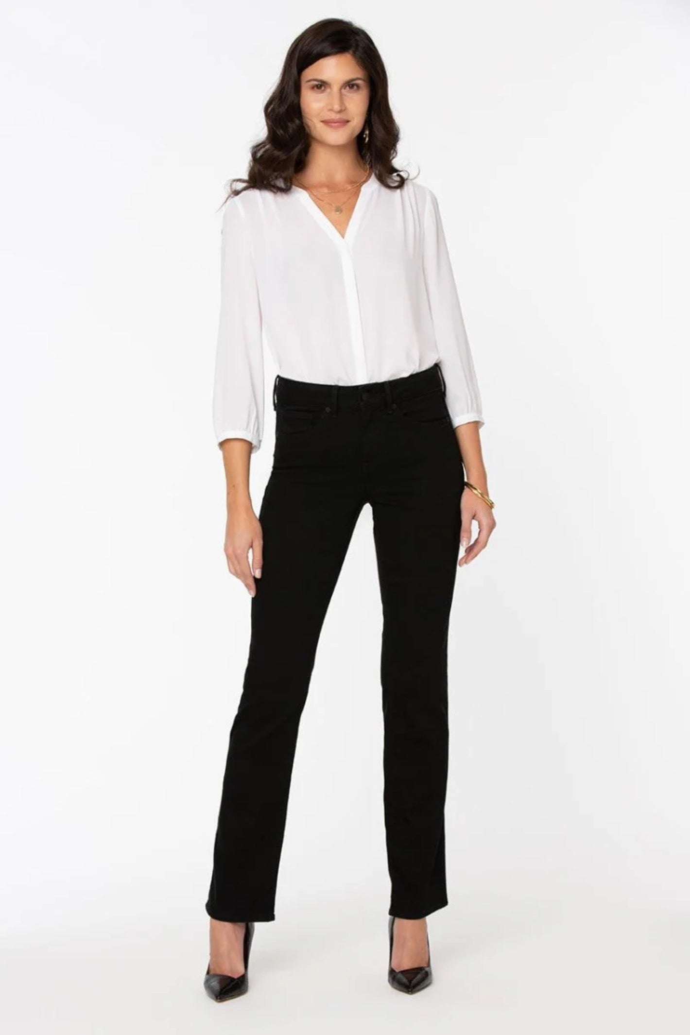Woman wearing NYDJ Marilyn Straight Black Jeans 30” styled with a white blouse, shop NYDJ at Dotique online.