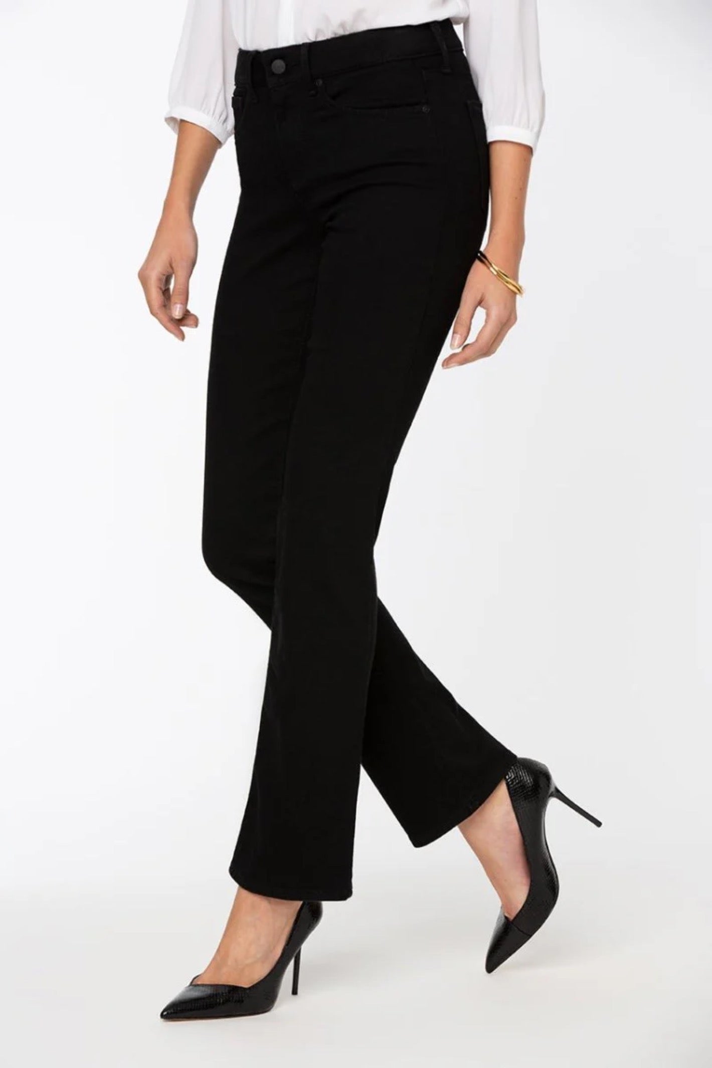 Model wearing NYDJ Marilyn Straight Black Jeans 30” by NYDJ, shop the vendor at Dotique for stylish black jeans.