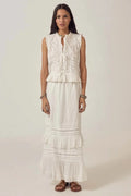 Woman wearing Maison Hotel Allegra Skirt Ponza Moonstone in white by Maison Hotel, shop Maison Hotel at Dotique