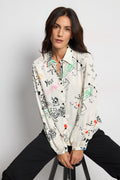 Shop the Tinta 4004468 Ilisa Women's Shirt in Natural at Dotique. A relaxed-fit printed shirt with playful graphic artwork, a classic collar and lightweight fabric for effortless everyday styling.