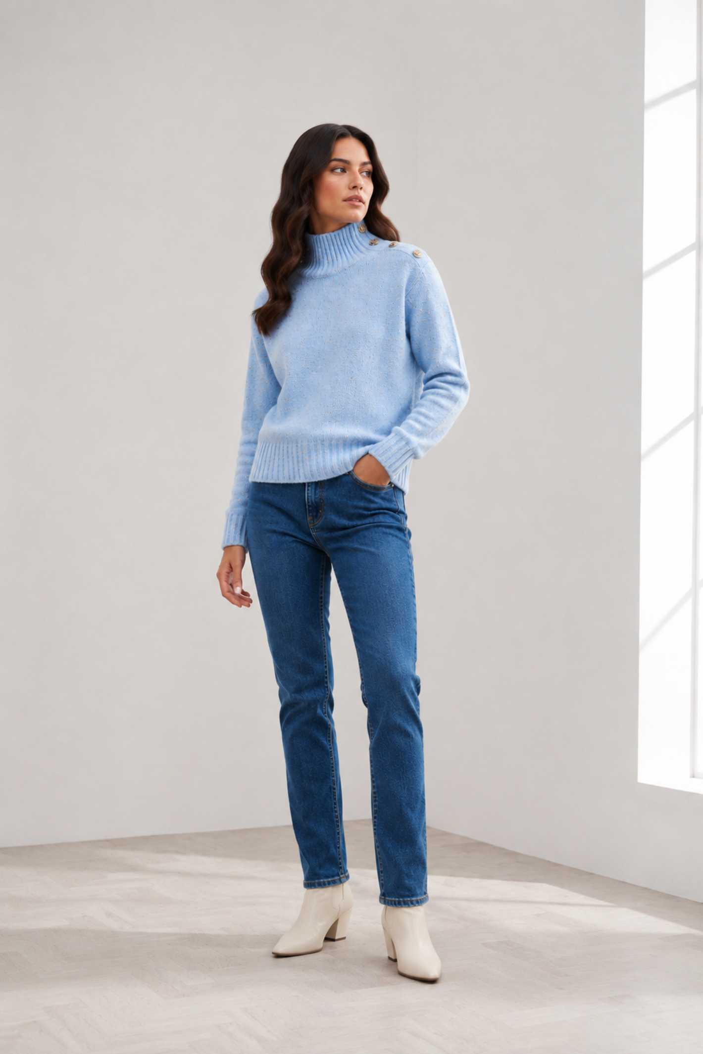 Shop the MICHA Pale Blue High Neck Jumper at Dotique. A soft blue women's knit with ribbed neckline, subtle flecked detail and statement shoulder buttons.