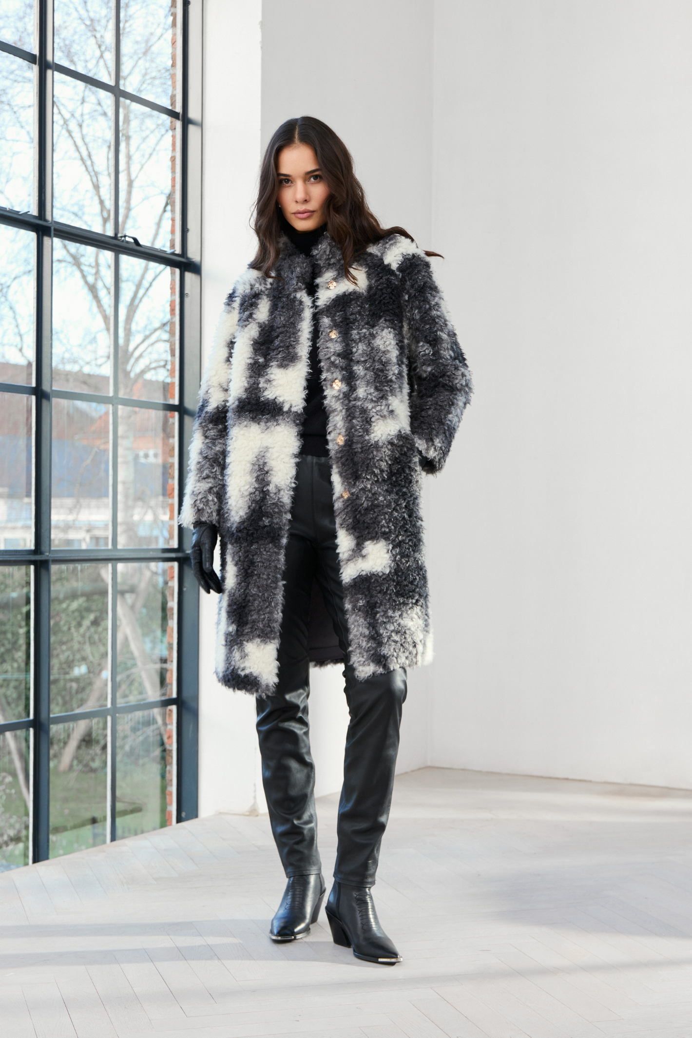 Shop the MICHA Black, Grey & Cream Faux Fur Long Coat at Dotique. A striking textured winter coat with an abstract monochrome design and longer length.