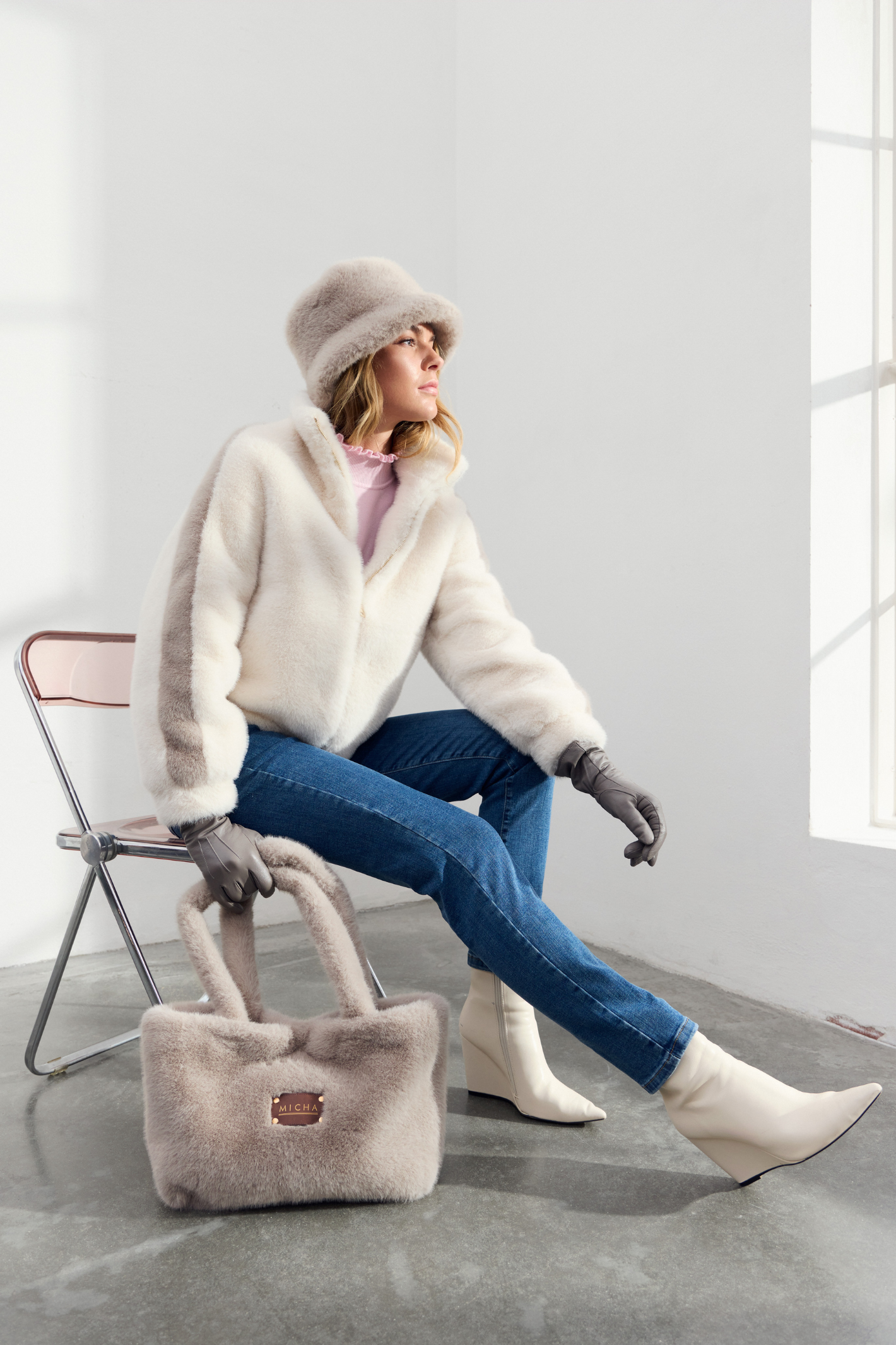 Shop the MICHA Cream Faux Fur Zip Jacket at Dotique. A soft cream faux fur jacket with a high neck and zip fastening, perfect for everyday winter layering.