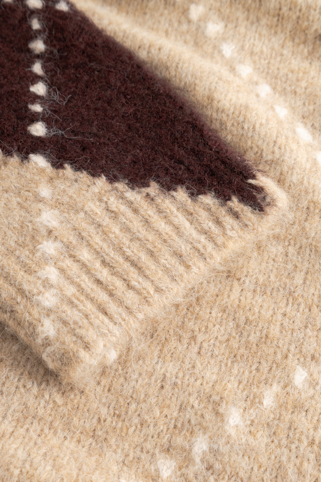 The Noella N-Laiana Knit Cardigan in Sand Melange is a beautiful example of this season's Highland Romance trend. Shop Noella at Dotique.