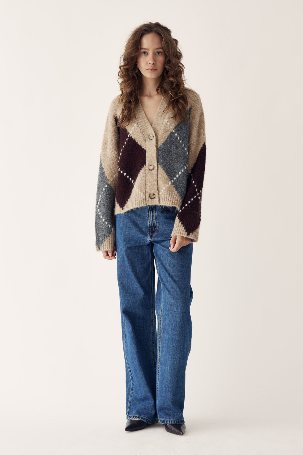 The Noella N-Laiana Knit Cardigan in Sand Melange is a beautiful example of this season's Highland Romance trend. Shop Noella at Dotique.