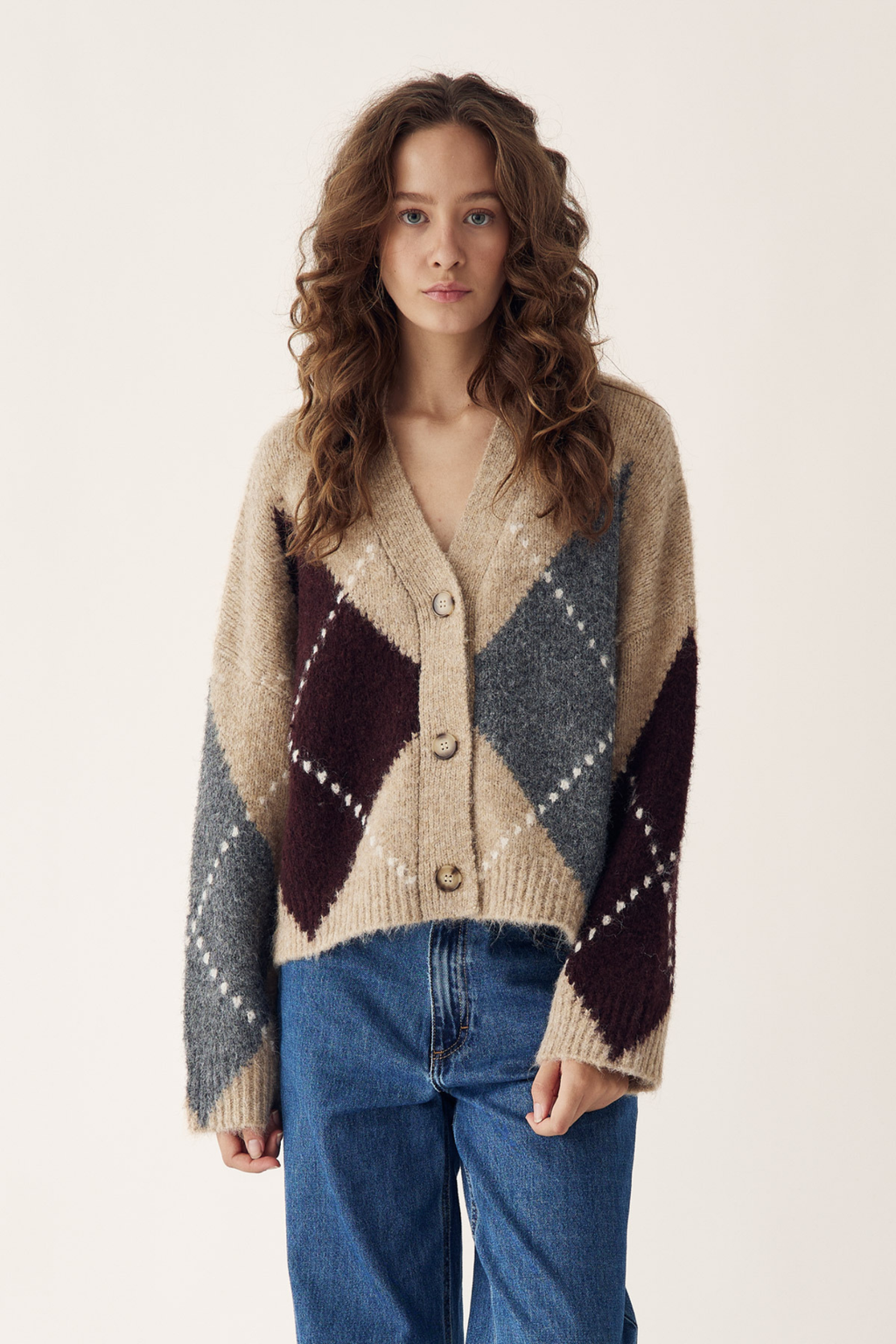 The Noella N-Laiana Knit Cardigan in Sand Melange is a beautiful example of this season's Highland Romance trend. Shop Noella at Dotique.