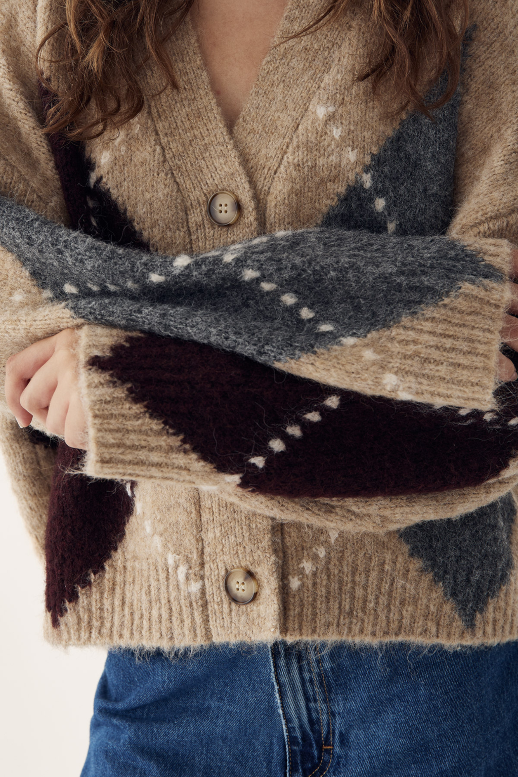 The Noella N-Laiana Knit Cardigan in Sand Melange is a beautiful example of this season's Highland Romance trend. Shop Noella at Dotique.