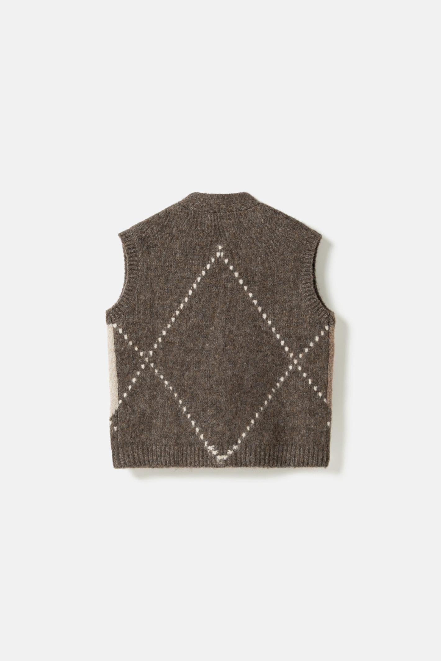 The Noella N-Laiana Knit Vest in Ash Brown Mix. Combining warm mocha, oatmeal, taupe and soft cream tones in a statement argyle design. Shop at Dotique.