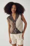 The Noella N-Laiana Knit Vest in Ash Brown Mix. Combining warm mocha, oatmeal, taupe and soft cream tones in a statement argyle design. Shop at Dotique.