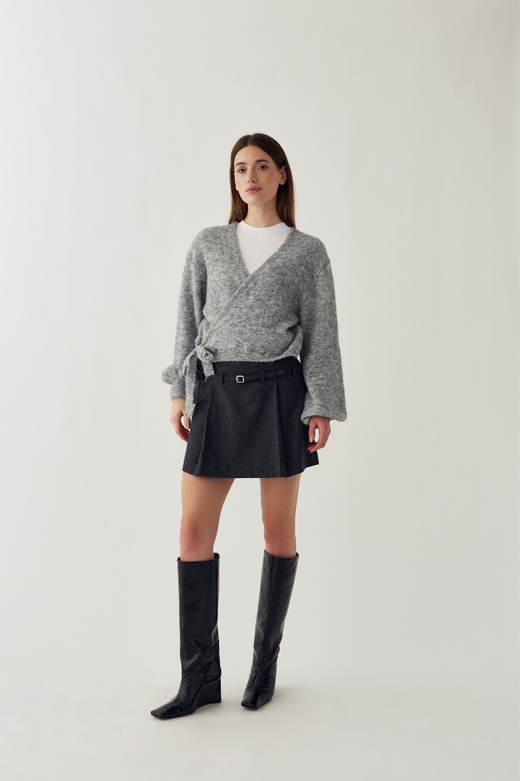 The Noella N-Madena Skirt in Dark Grey Melange is a modern take on classic Highland Romance styling.Shop Noella at Dotique.