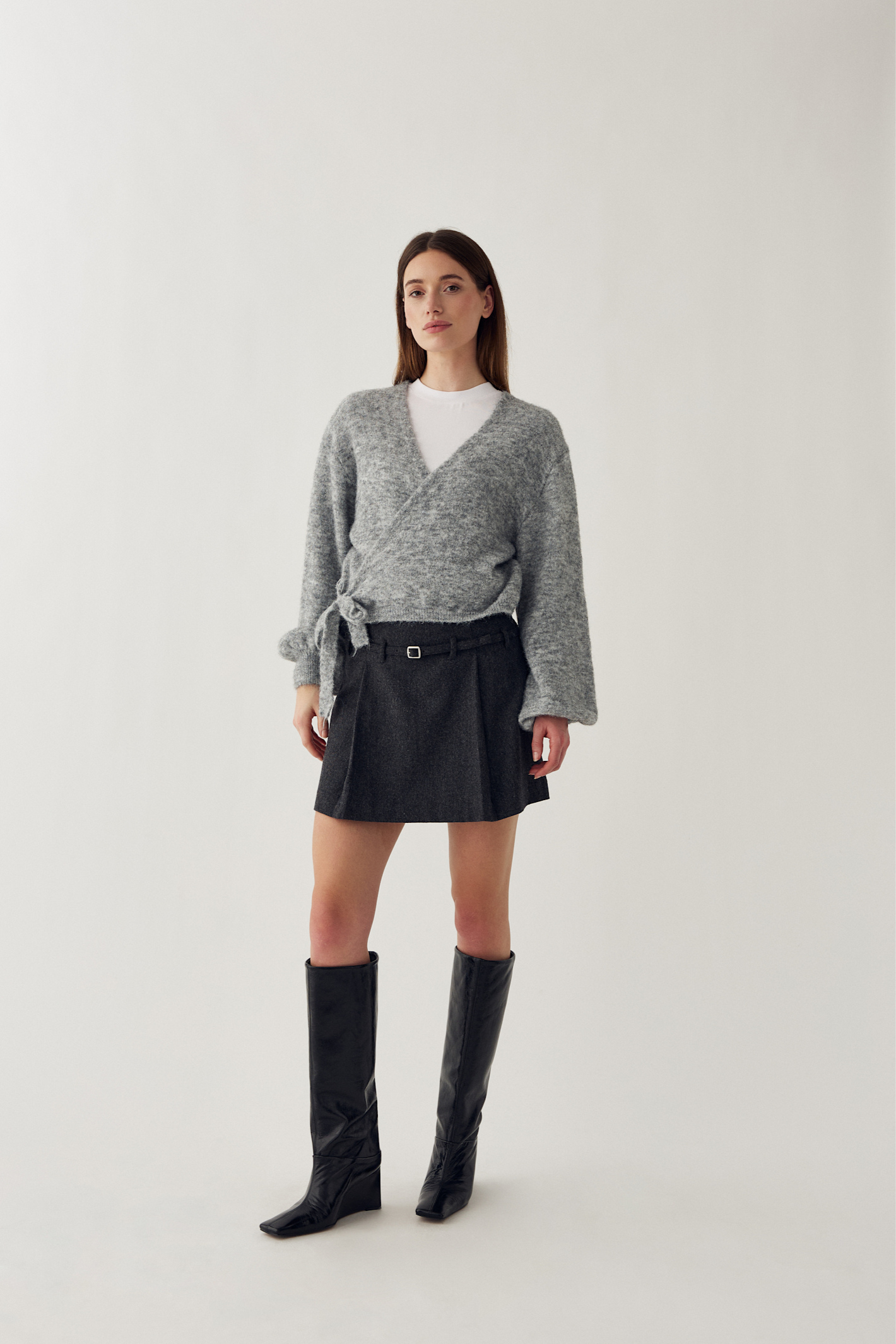 The Noella N-Madena Skirt in Dark Grey Melange is a modern take on classic Highland Romance styling.Shop Noella at Dotique.