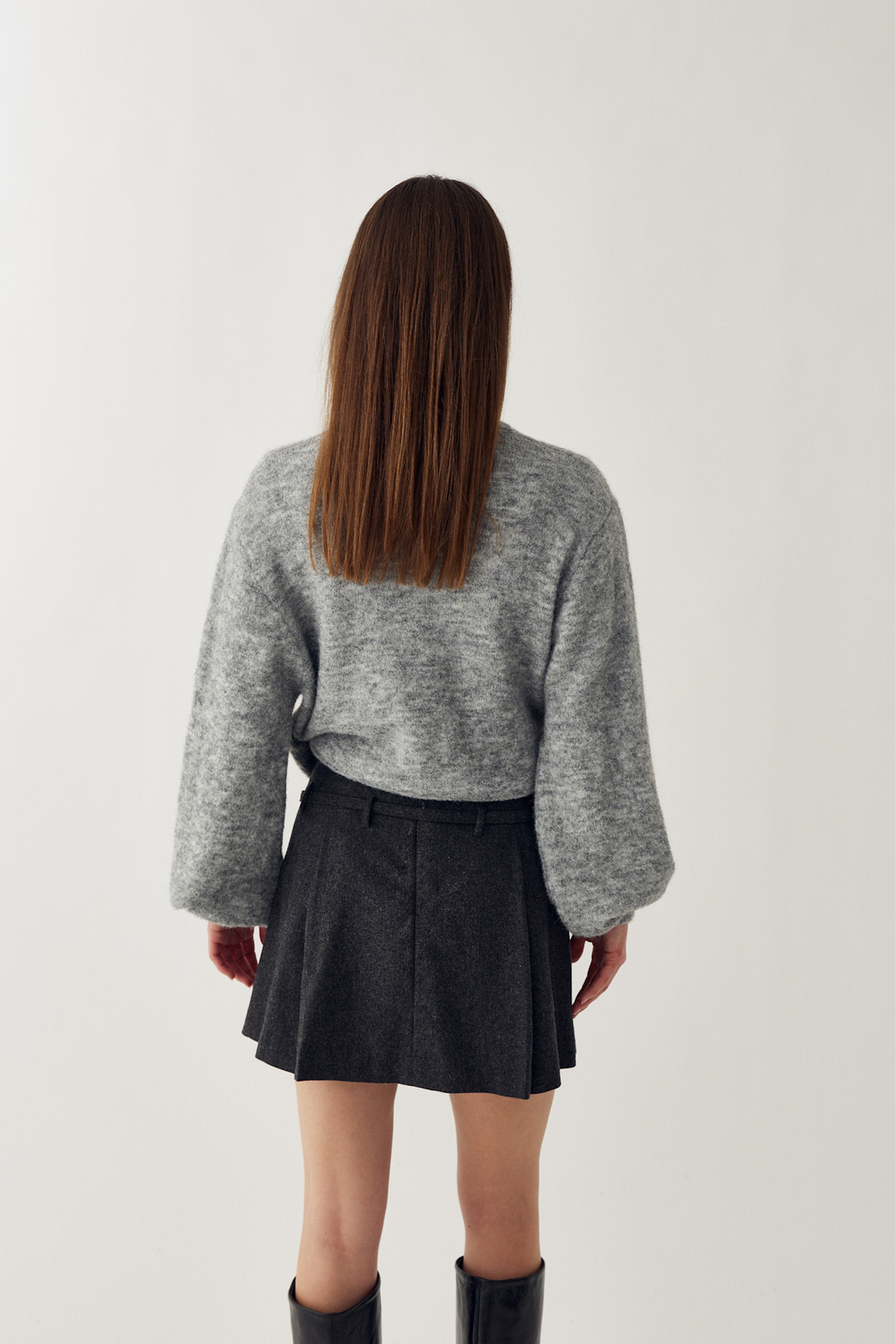 The Noella N-Madena Skirt in Dark Grey Melange is a modern take on classic Highland Romance styling.Shop Noella at Dotique.