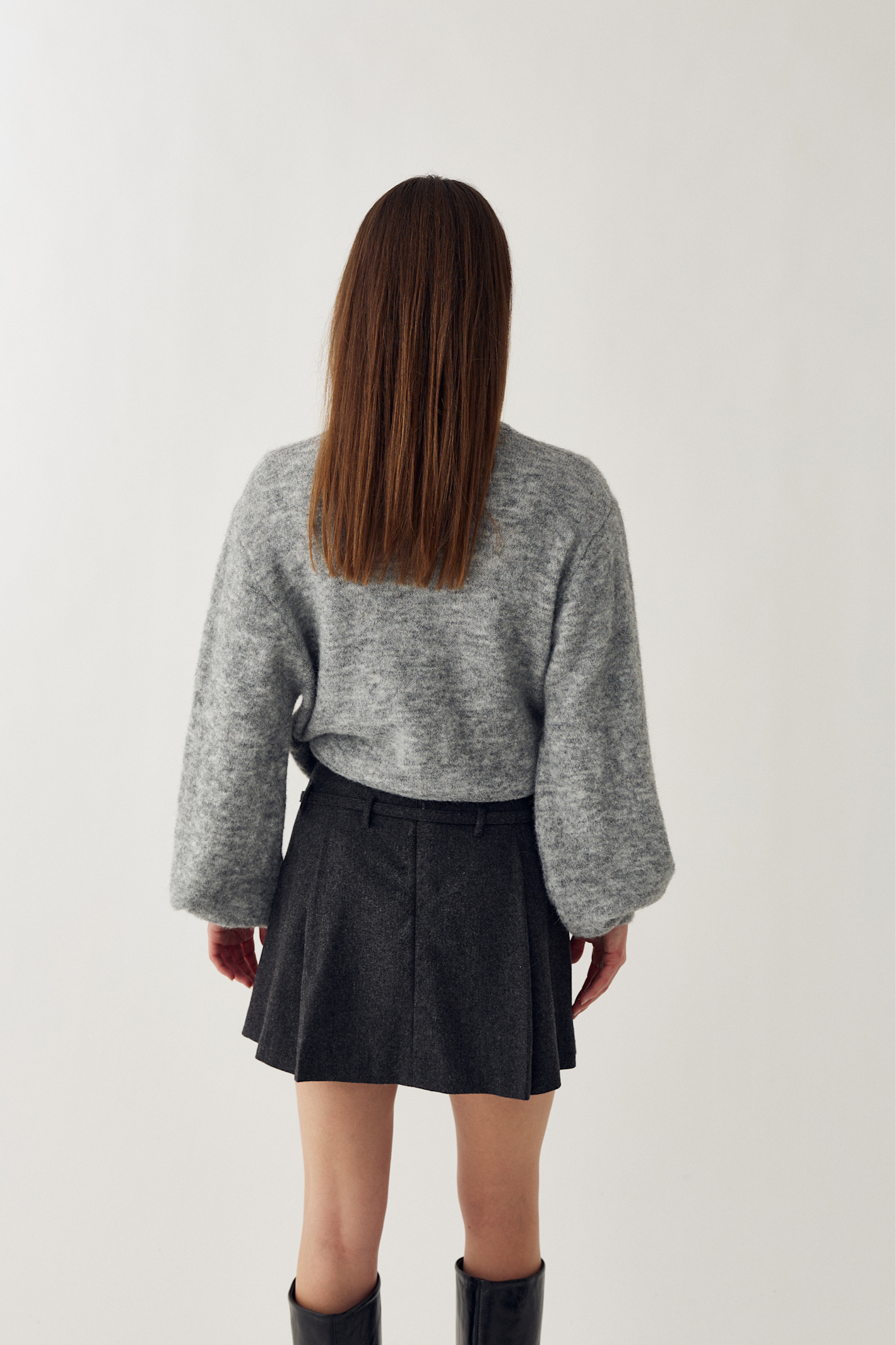 The Noella N-Madena Skirt in Dark Grey Melange is a modern take on classic Highland Romance styling.Shop Noella at Dotique.