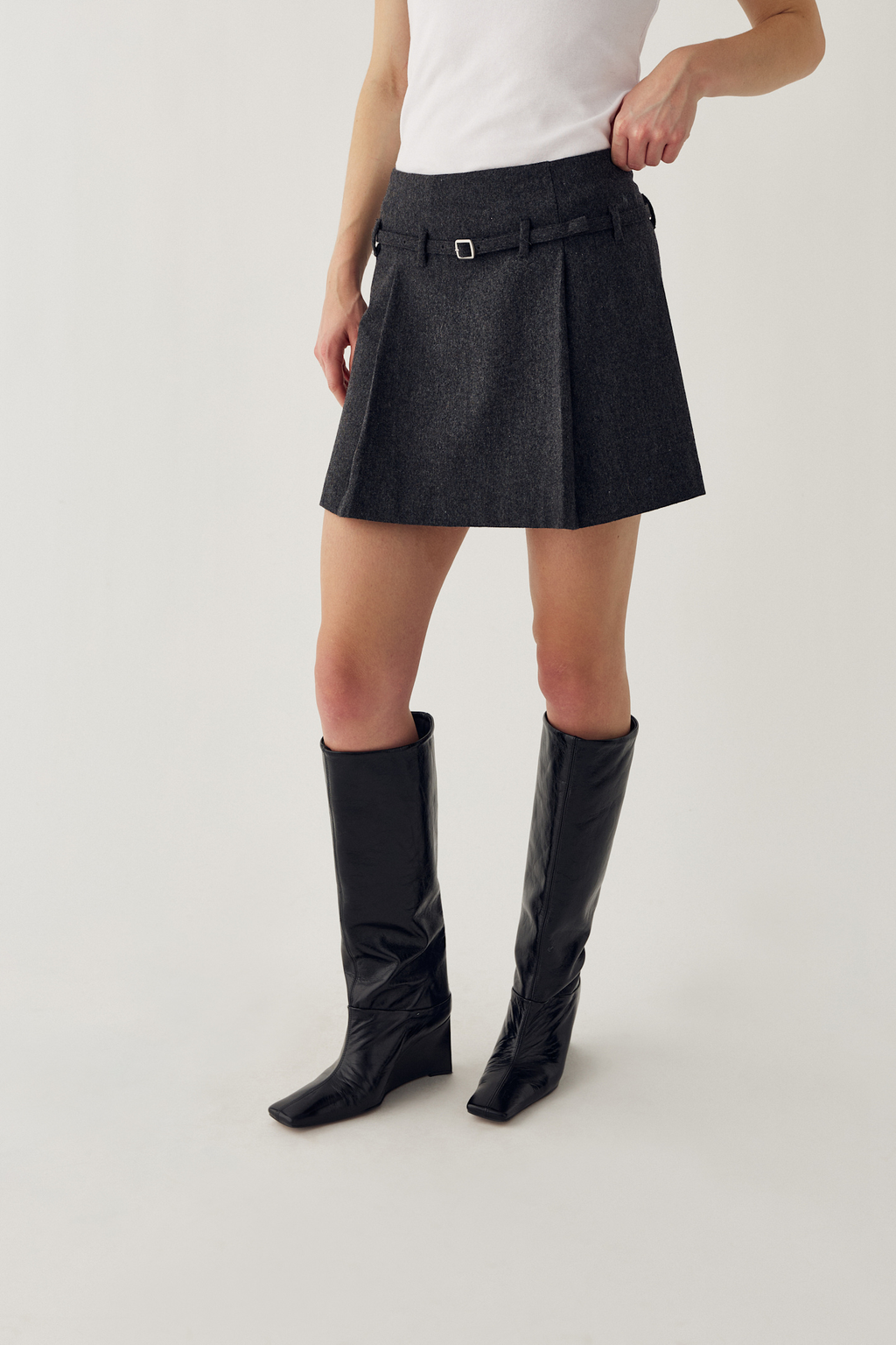 The Noella N-Madena Skirt in Dark Grey Melange is a modern take on classic Highland Romance styling.Shop Noella at Dotique.