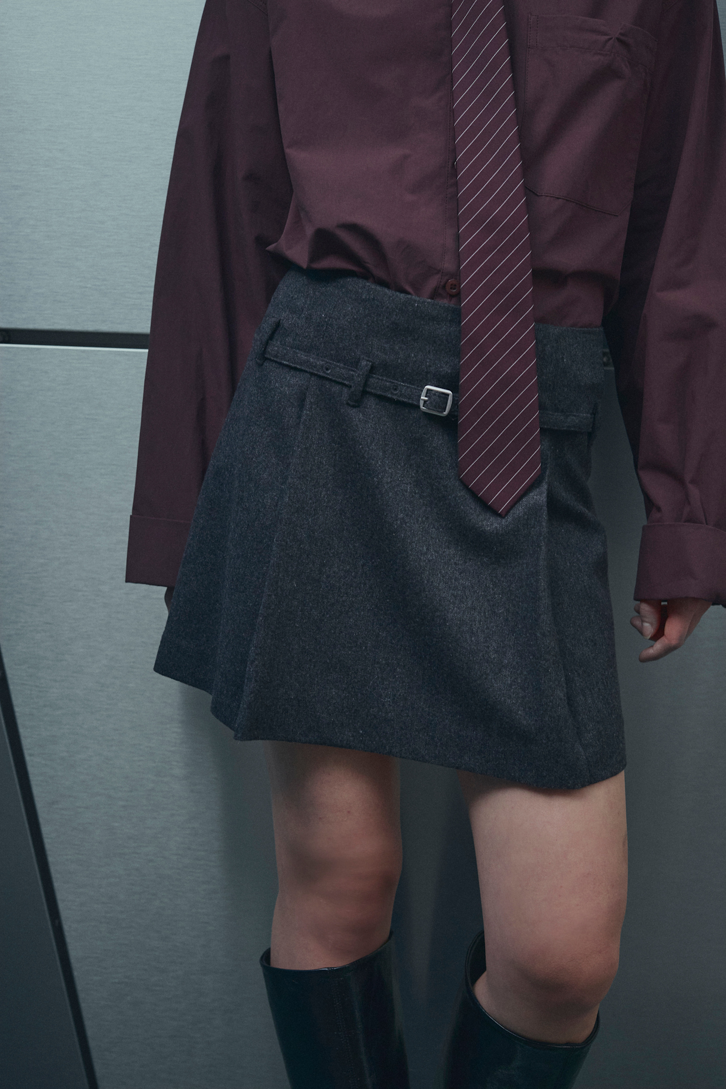 The Noella N-Madena Skirt in Dark Grey Melange is a modern take on classic Highland Romance styling.Shop Noella at Dotique.