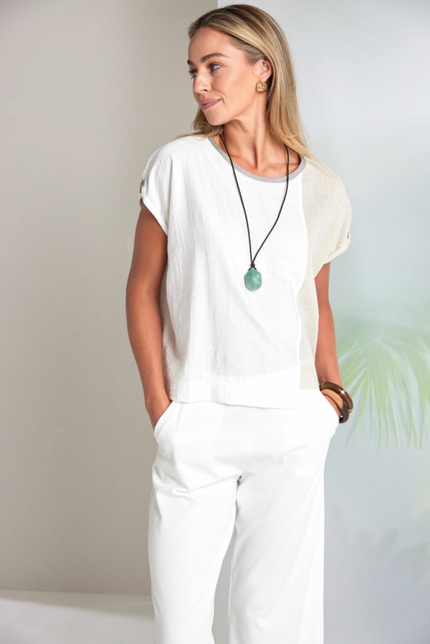 Model wearing Naya NAS26237 White Wide Leg Pull-On Trousers by Naya, available to shop at Dotique.