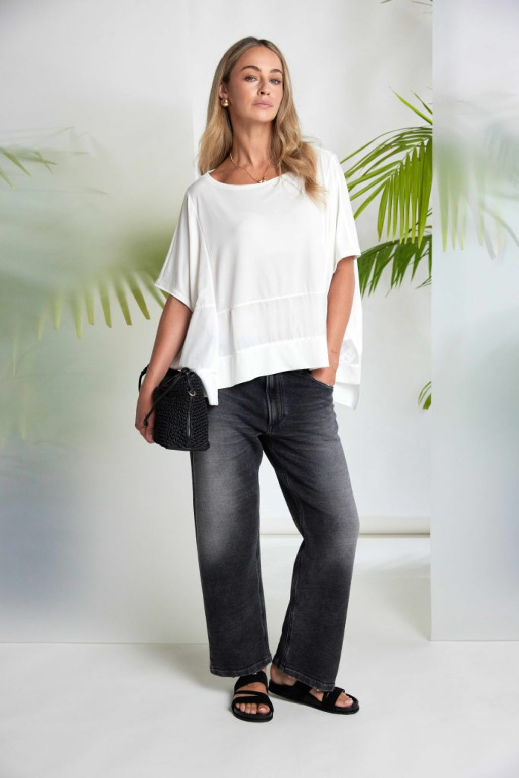 Model wearing Naya NAS26169 Cream Square Shape Top by Naya, relaxed fit, shop Naya styles at Dotique for modern softness