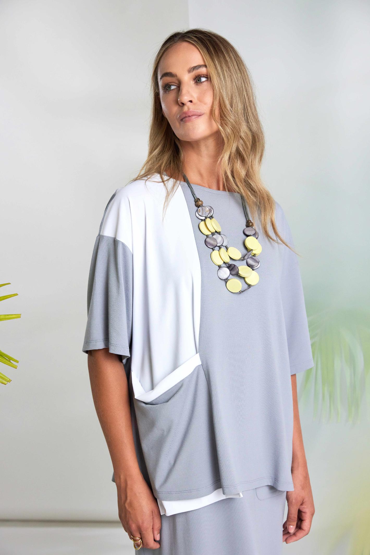 Woman wearing Naya NAS26178 Dove Grey White Mixed Panel Top by Naya shop Naya at Dotique in modern casual style