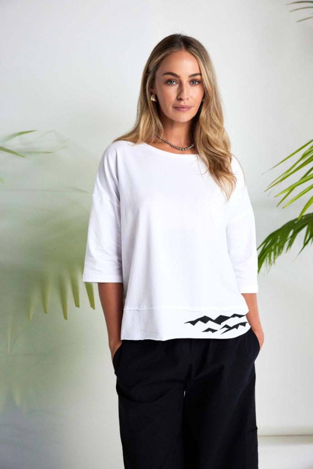 Model wearing Naya NAS26260 Black Balloon Shape Trousers by Naya, shop the vendor at Dotique for modern volume and comfort.