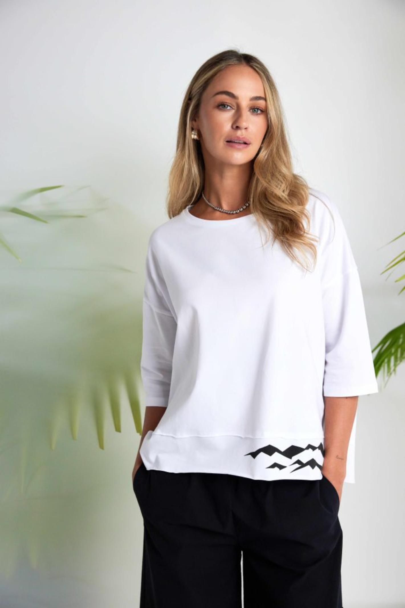 Woman wearing Naya NAS26260 Black Balloon Shape Trousers by Naya, available to shop at Dotique.