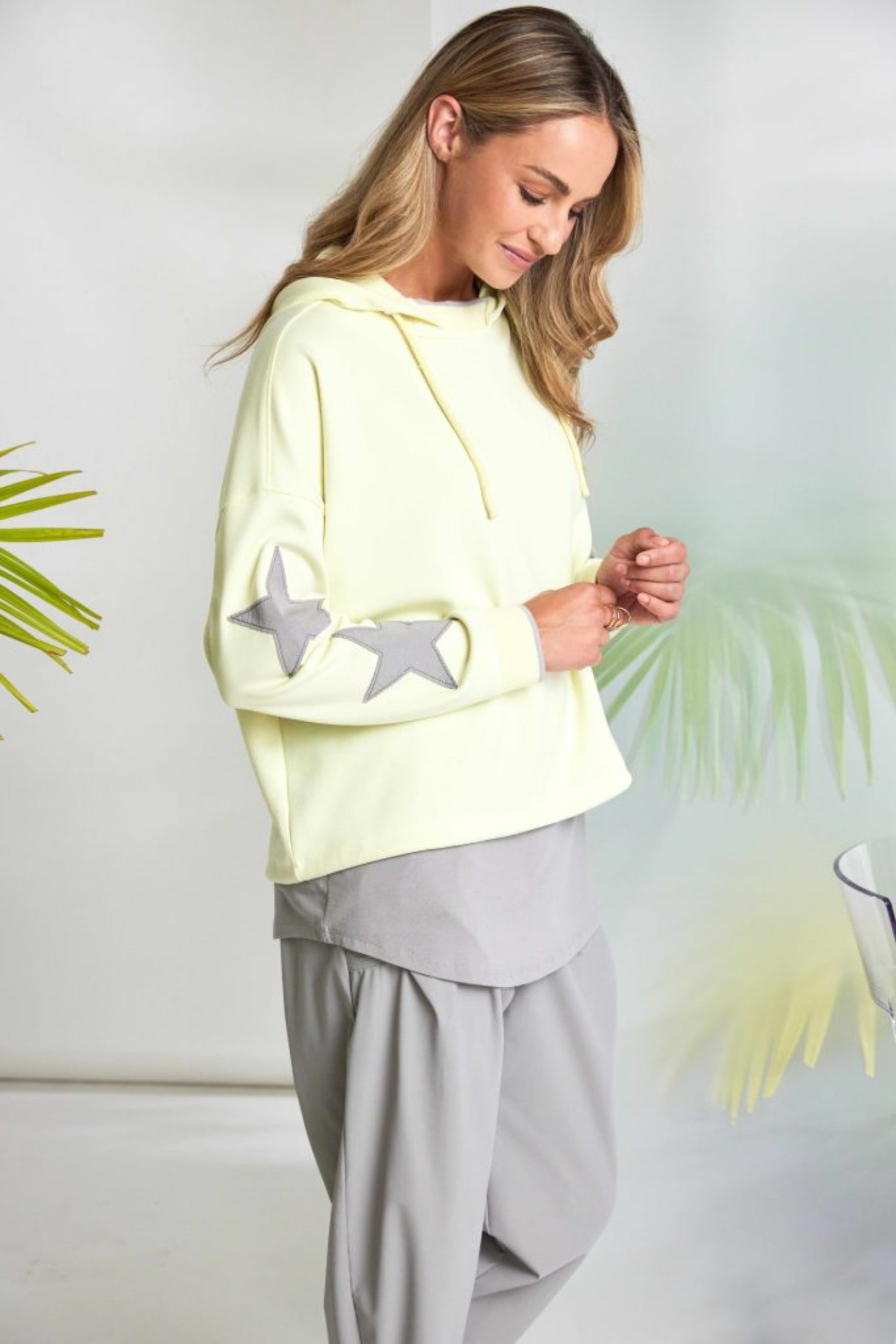 Naya NAS26214 Lemon Star Sleeve Hooded Top With Contrast Cuffs by Naya shown on model Shop Naya at Dotique