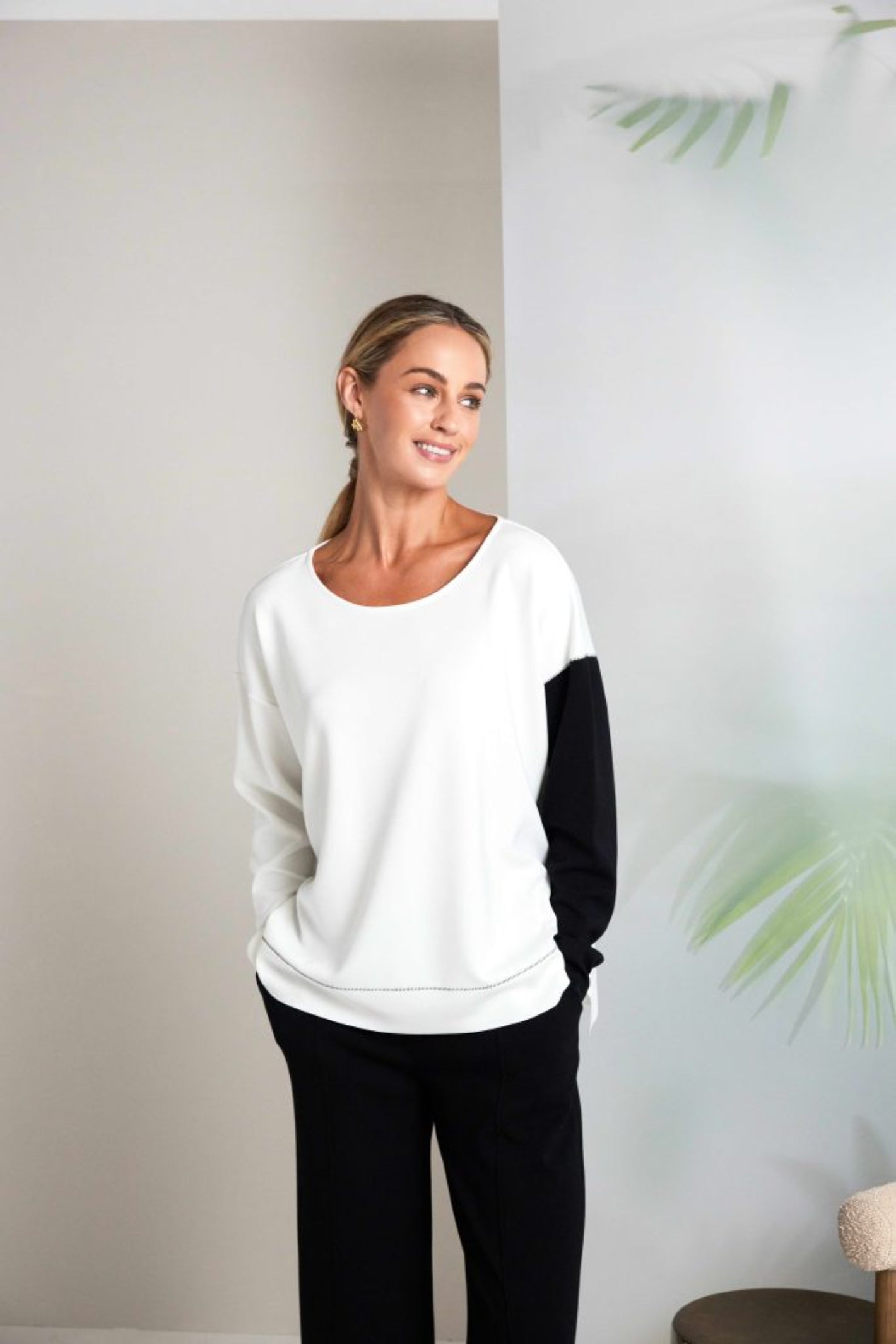 Woman wearing Naya NAS26228 Colour Block Sleeve Sweatshirt Cream & Black by Naya Shop the vendor at Dotique