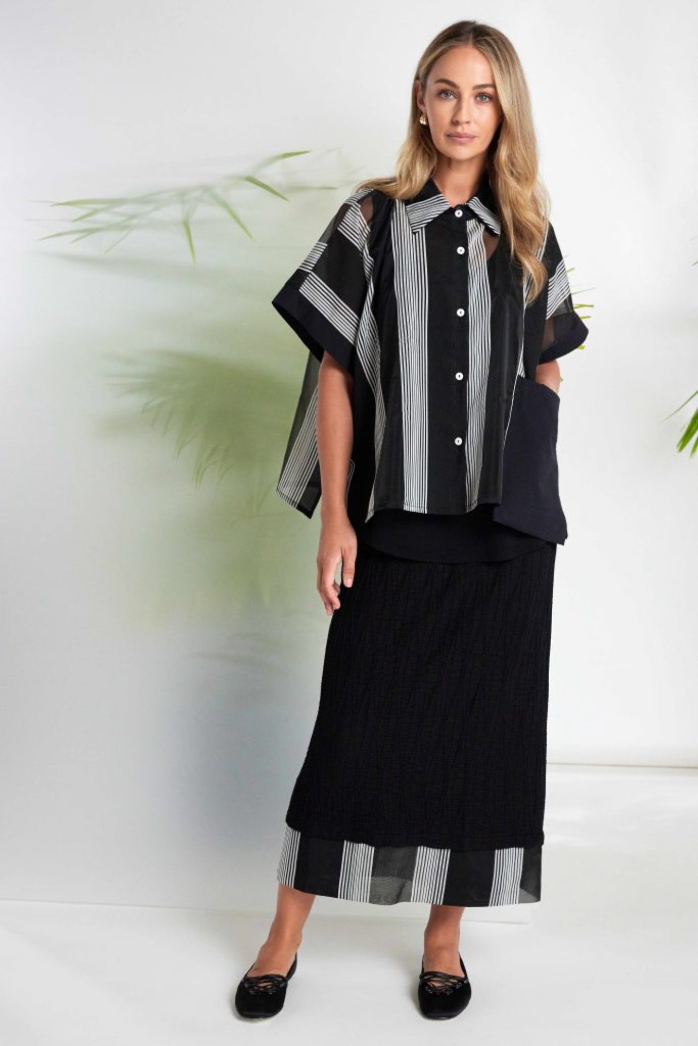 Naya NAS26258 Embossed Pull-On Midi Skirt with Stripe Hem by Naya styled on model Shop Naya at Dotique for effortless elegance