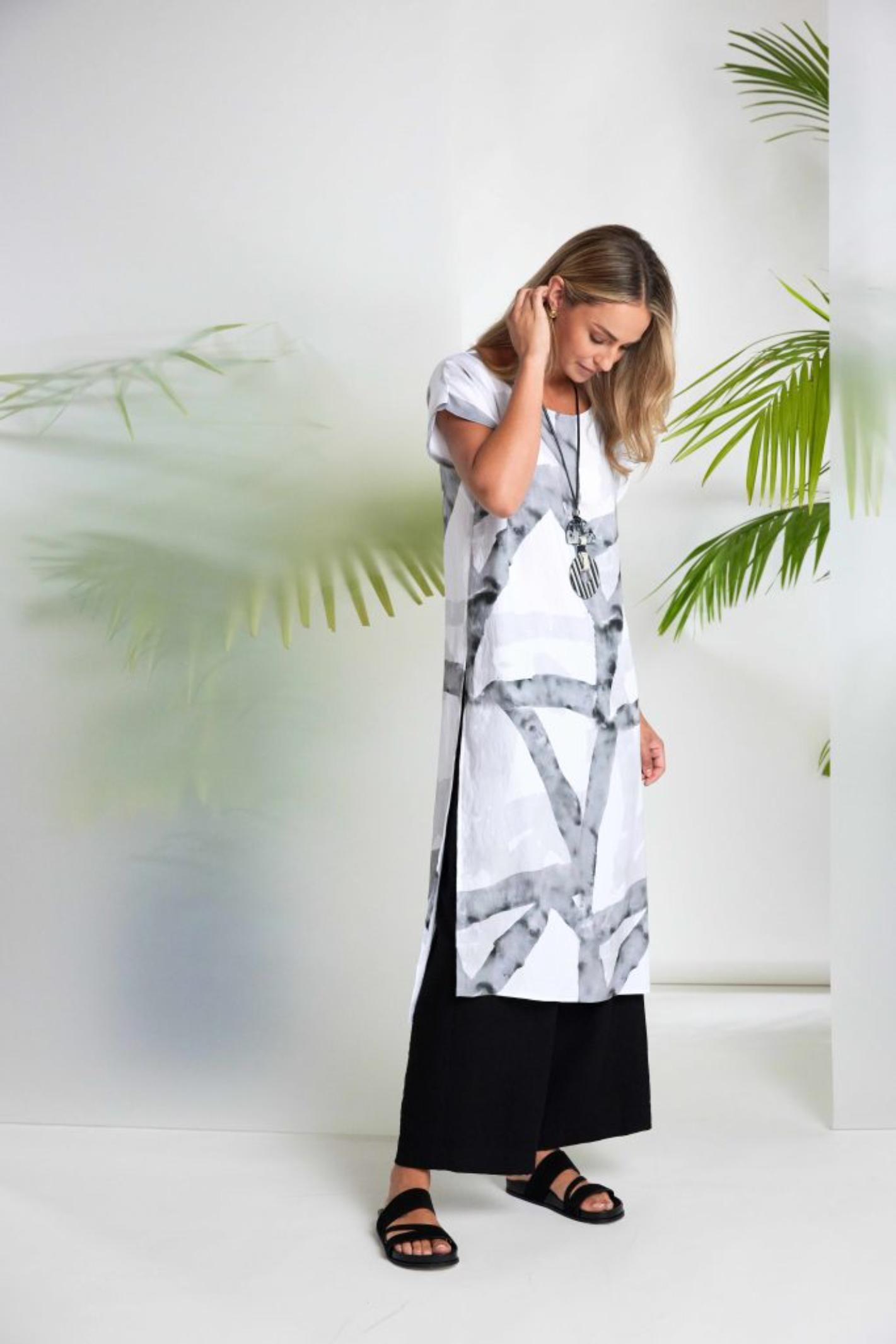 Model wearing Naya NAS26313 Marbled Ribbon Print Round Neck Dress – White & Grey Shop Naya at Dotique