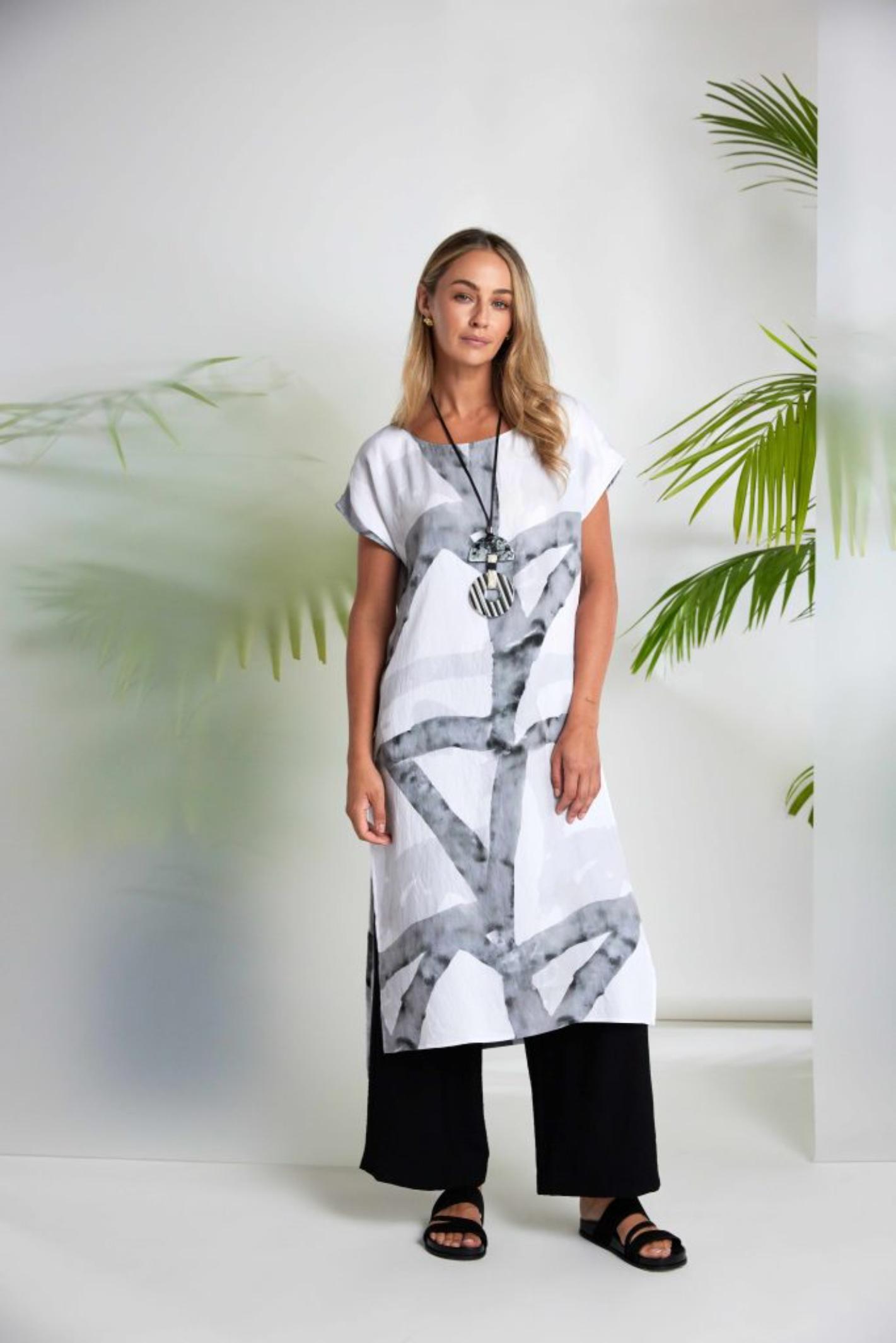Model wearing Naya NAS26313 Marbled Ribbon Print Round Neck Dress – White & Grey by Naya Shop the Naya collection at Dotique