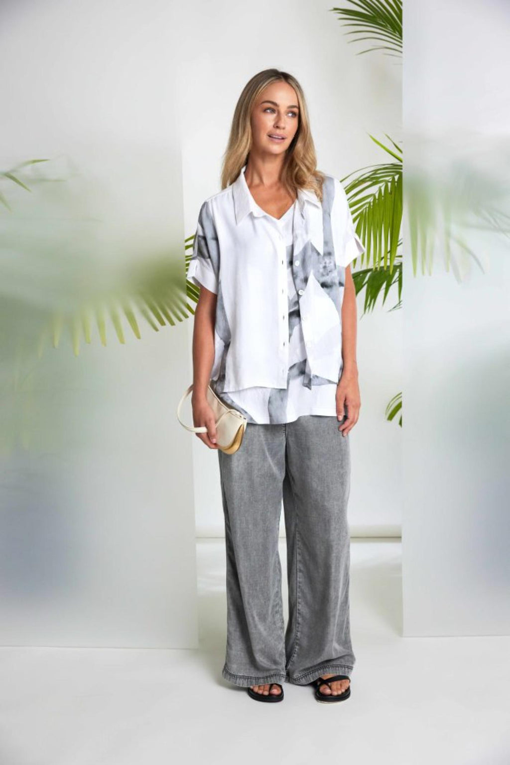 Woman wearing Naya NAS26314 Marbled Ribbon Print V-Neck Top – White & Grey by Naya Shop Naya at Dotique