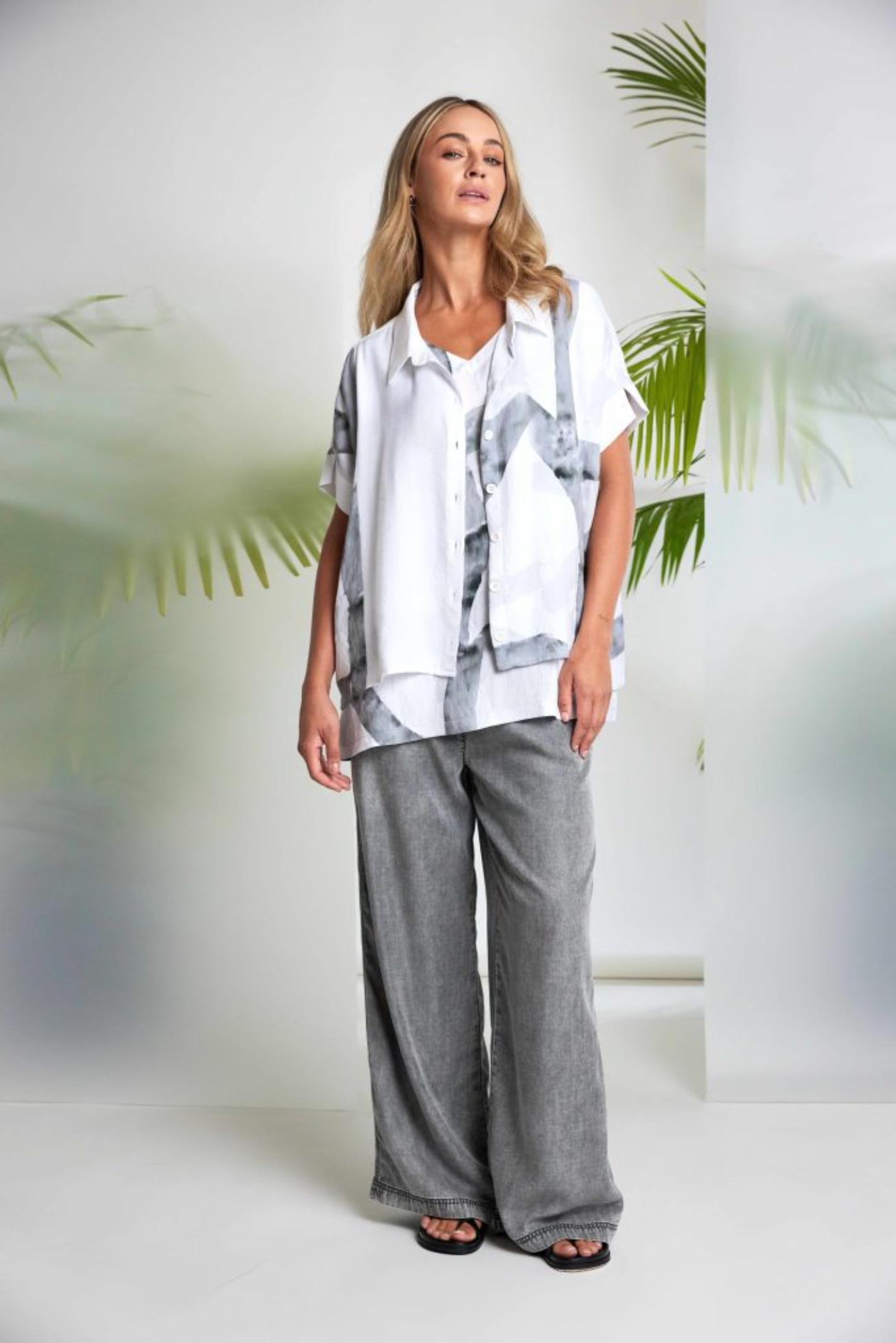 Model wearing Naya NAS26314 Marbled Ribbon Print V-Neck Top – White & Grey by Naya, shop Naya at Dotique.