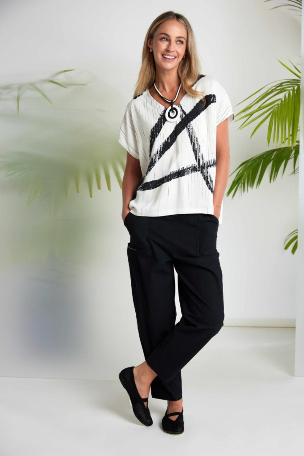 Naya NAS26319 Cream Black Brush Stroke V-Neck Top worn by model, shop Naya at Dotique for stylish bold prints and comfort