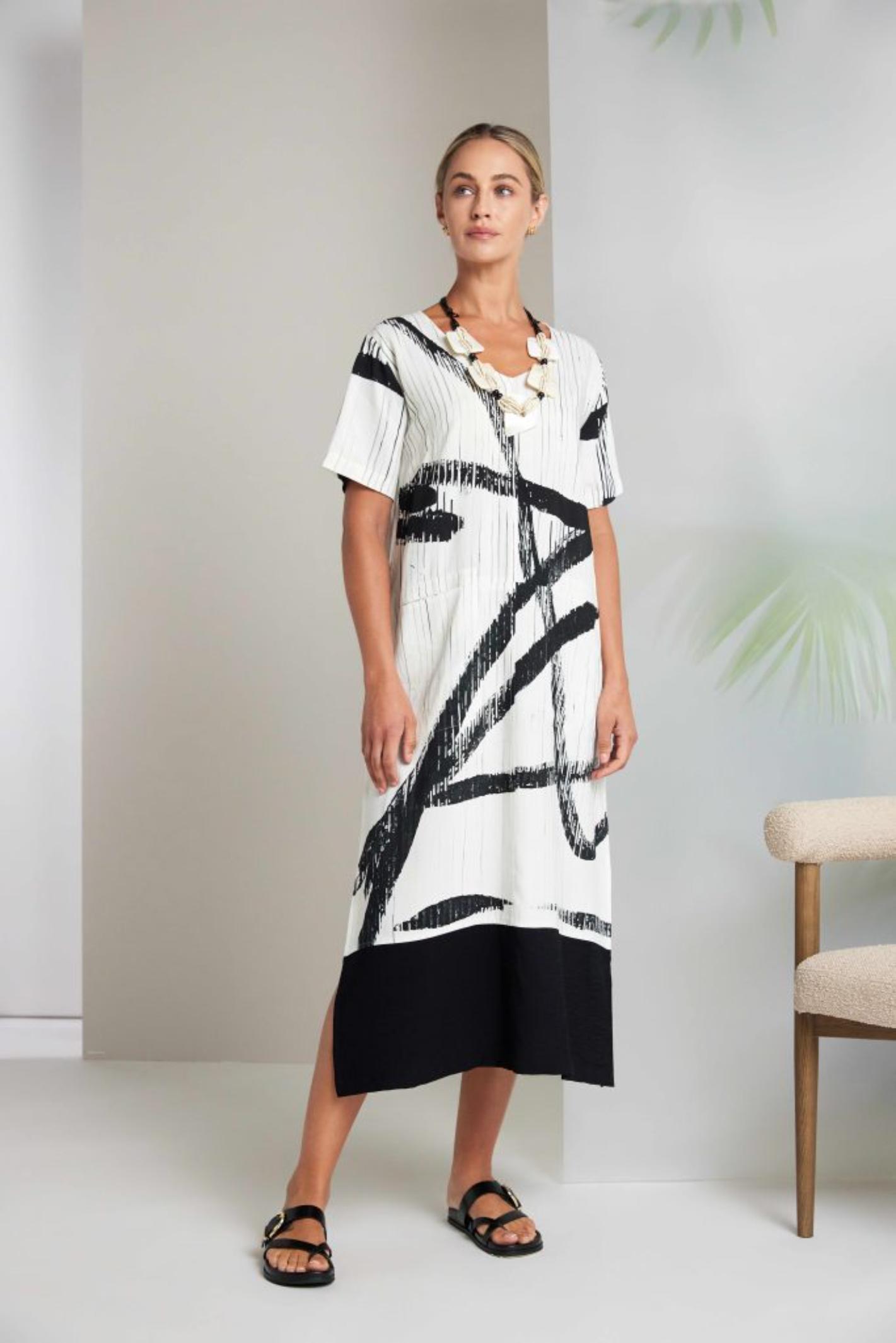 Naya NAS26320 Cream Black Brush Stroke Dress by Naya shown worn with sandals, shop Naya at Dotique online